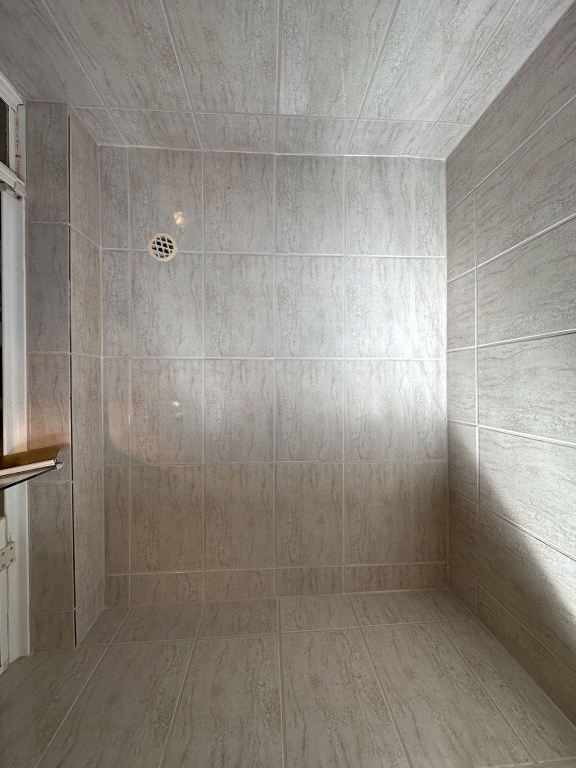 After view of light grey shower